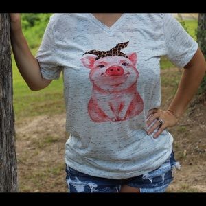 Super cute pig shirt on a Bella canvas tee.